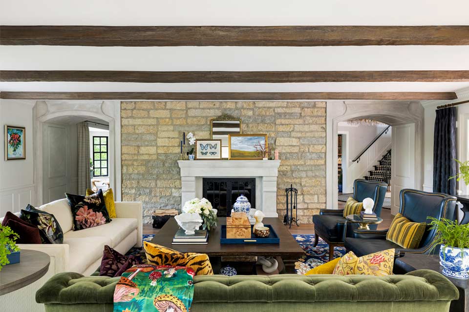 Vintage Inspired living room with vintage furniture and stone fireplace.